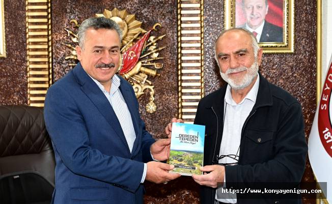 Kartal, Başkan Tutal’a kitabını hediye etti